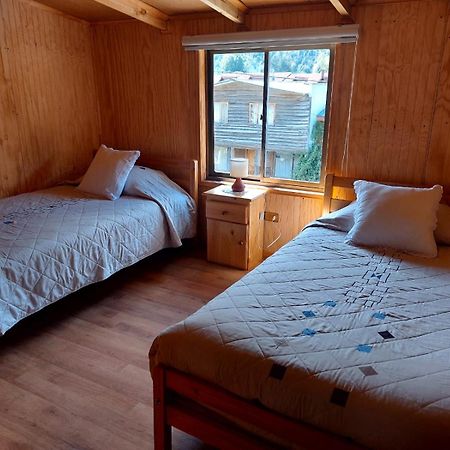 Hostal Y Cabanas Ventisquero 푸에르토 푸유구아피 외부 사진