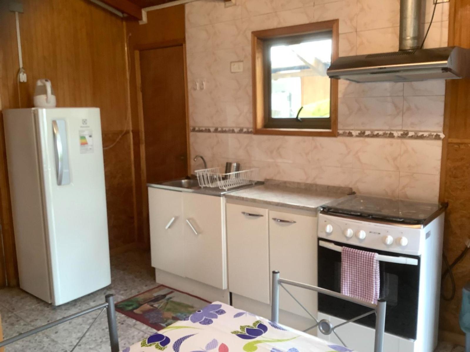 Hostal Y Cabanas Ventisquero 푸에르토 푸유구아피 외부 사진